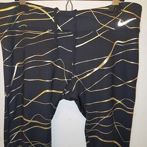 Nike Kids Black and Gold Leggings